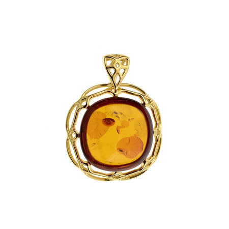 Silver pendant with amber