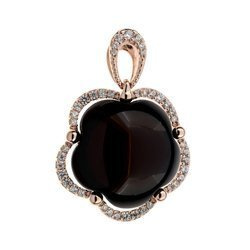 Silver pendant with amber