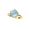 Gold ring with blue topaz