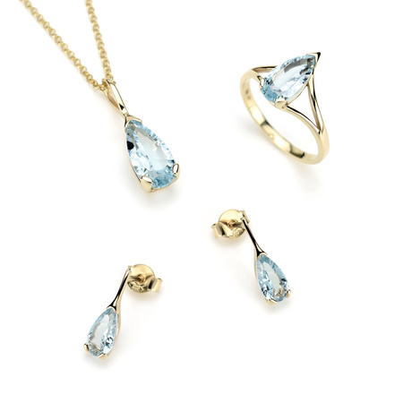 Gold pendant with blue topaz