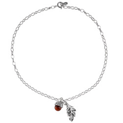 Silver bracelet with amber on the leg