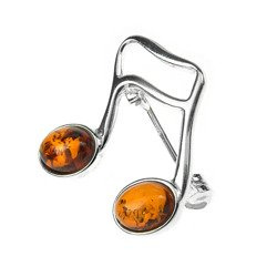 Silver brooch with amber