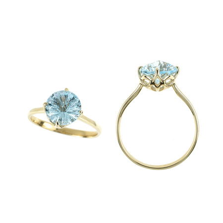 Gold ring with blue topaz